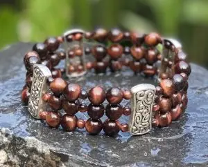 Kralen armband Tijgeroog donkerbruin 4,6 en 8mm met Tibitaans Zilver