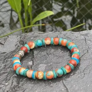 Kralen armband , Orange 8mm, met spacer schelpdisc turquoise rond 3mm