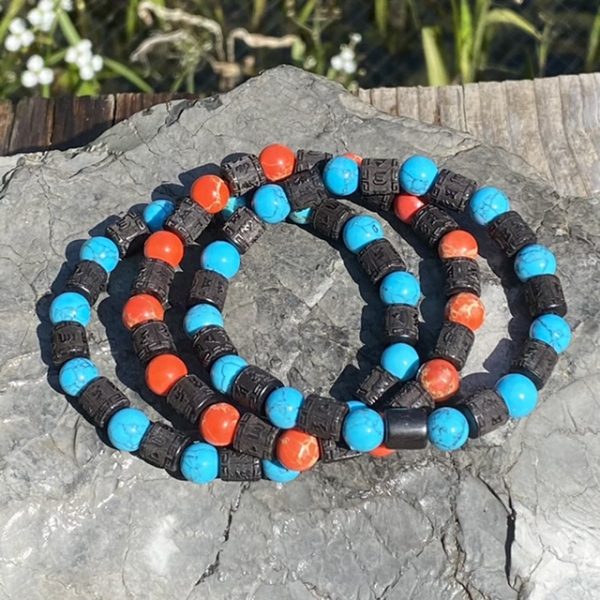 Dames en heren armbandenset Ebbenhout en kralen Turquoise/oranje