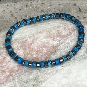Armbanden platte Heishi kralen 6mm petrol blauw