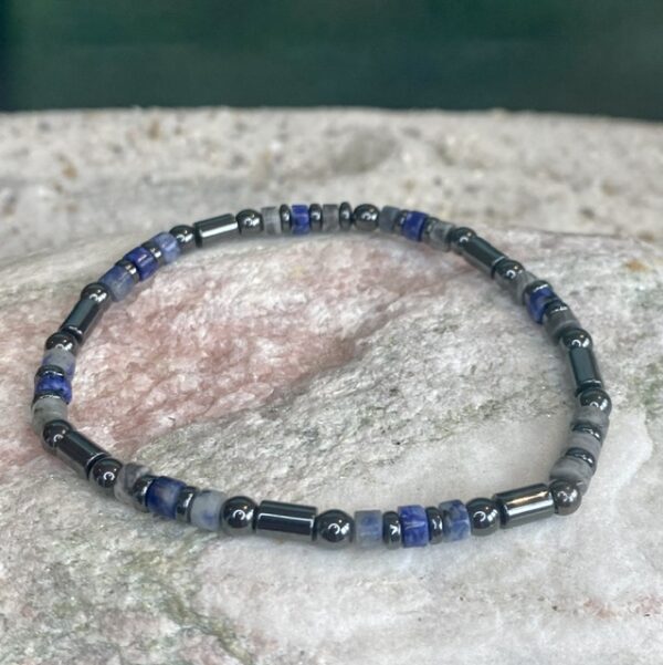 Armbanden platte heishi kralen 4x2mm blauw gemêleerd