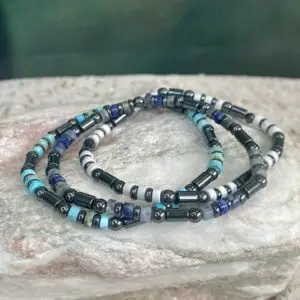 Armbanden platte heishi kralen 4x2mm wit, turquoise en blauw