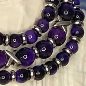 Armbanden JaXX/Cross tijgeroog paars 6 en 8 mm met Edelstaal