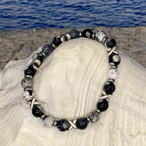 Armband JaXX/Cross black&white uitgevoerd met edelstaal.