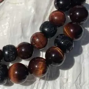 Kralen armband Tijgeroog 8/10 mm donker bruin met Boeddhistische houten Jujube kralen