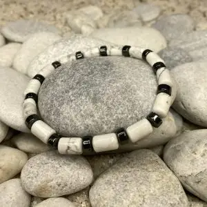 Armband Inner Flow Cilindervorm 6 x 10mm Howliet met Hematiet