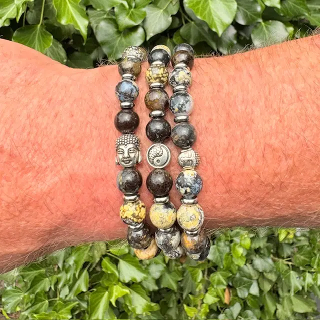 a person's wrist with bracelets